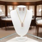 Ruby Accent Rectangle Pendant Set beautifully presented on white display bust showing full necklace and earrings