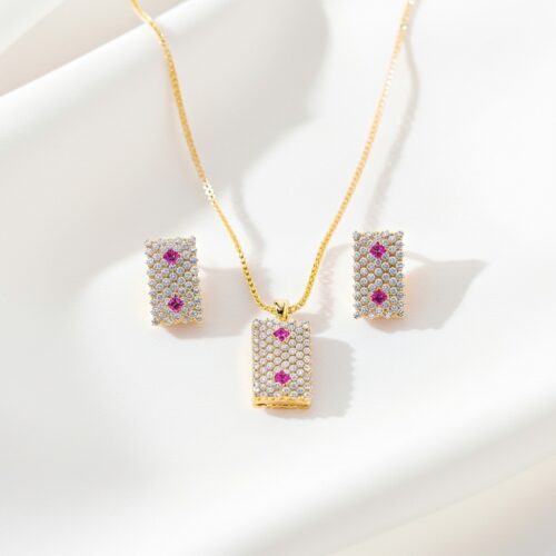 StudioShot Studio shot of Ruby Accent Rectangle Pendant Set on white background displaying the sparkling stones and ruby accents
