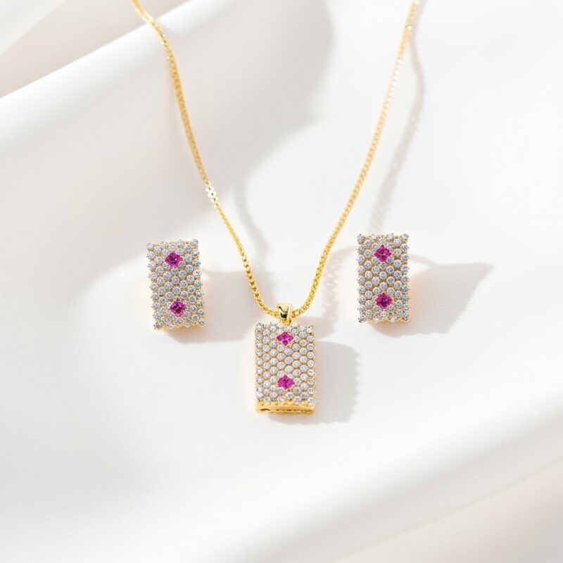Studio shot of Ruby Accent Rectangle Pendant Set on white background displaying the sparkling stones and ruby accents