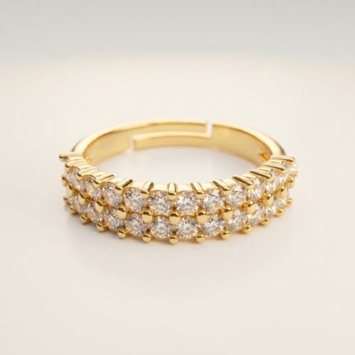 studioshot1 Studio shot of Double Row Brilliance Adjustable Ring on clean background showing two full rows of sparkling round stones and warm gold finish